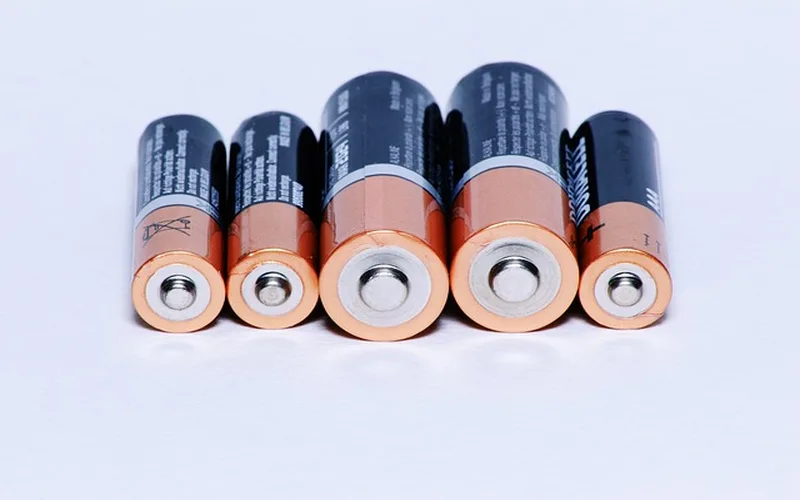 Car battery charger clamps connected correctly with red positive and black negative cables Car battery charger clamps connected correctly with red positive and black negative cables