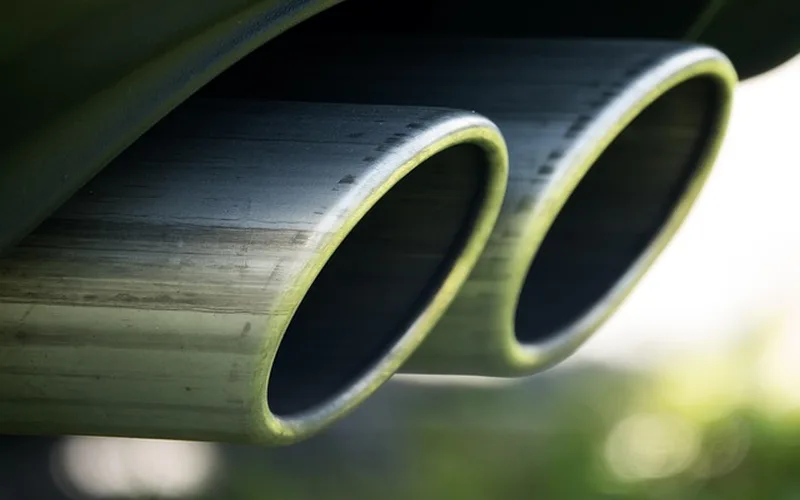 Car exhaust system showing oxygen sensor location for lean fuel mixture repair