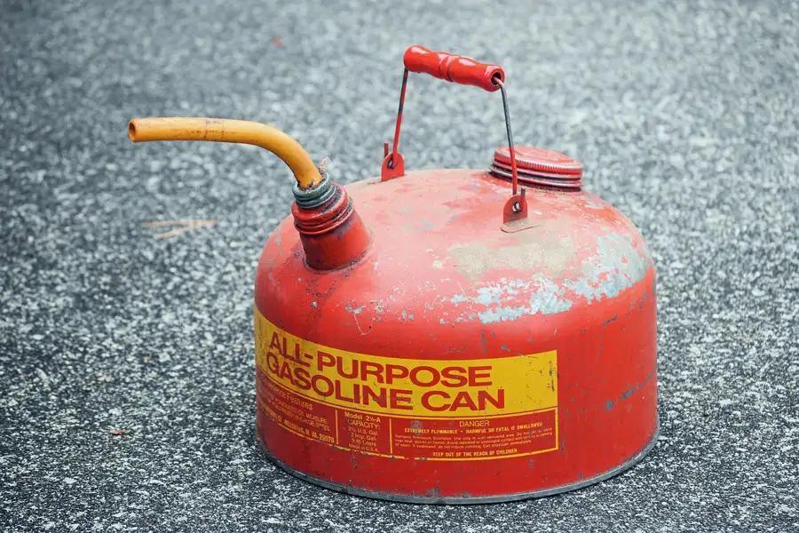 An old gasoline can showing rust and grime
