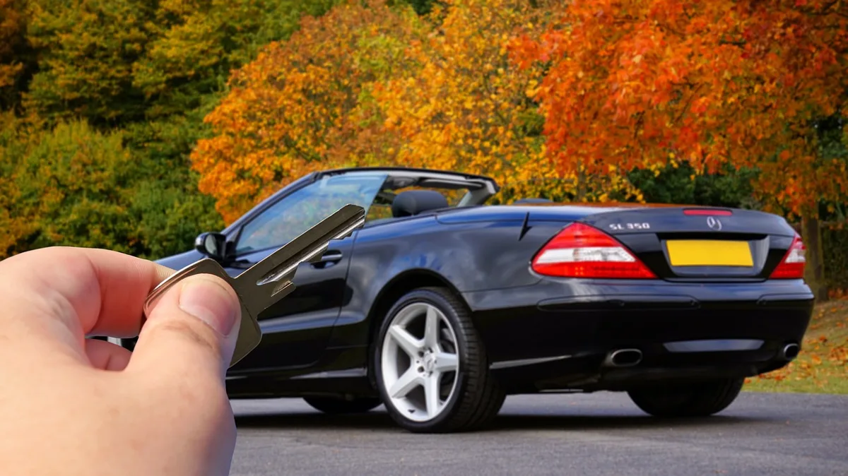 Handing over car keys to a friend borrowing the vehicle