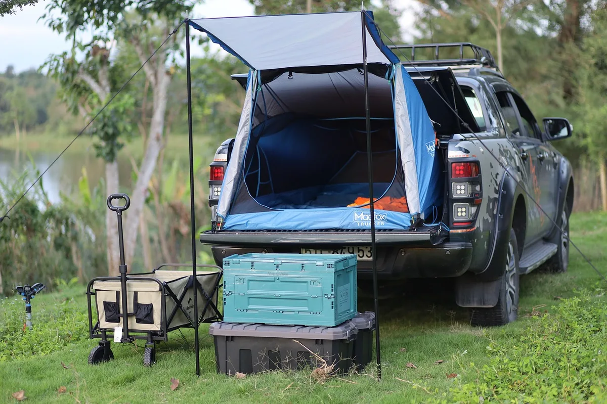 Truck bed set up for camping gear, the kind of cargo the FLEXBED system is designed to carry