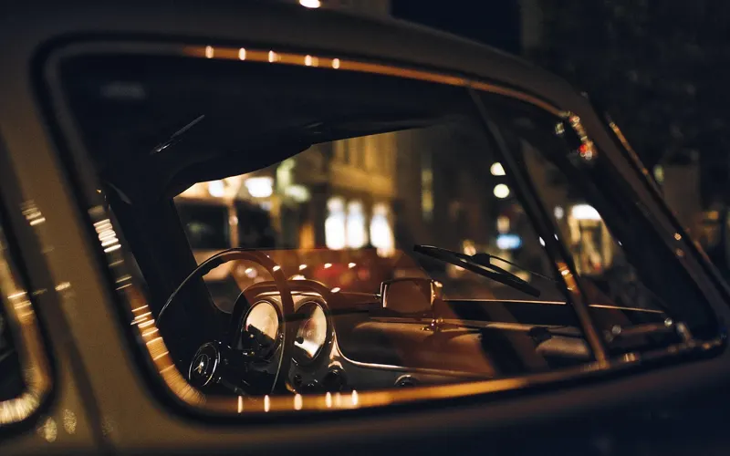 classic Mercedes-Benz luxury sedan at night