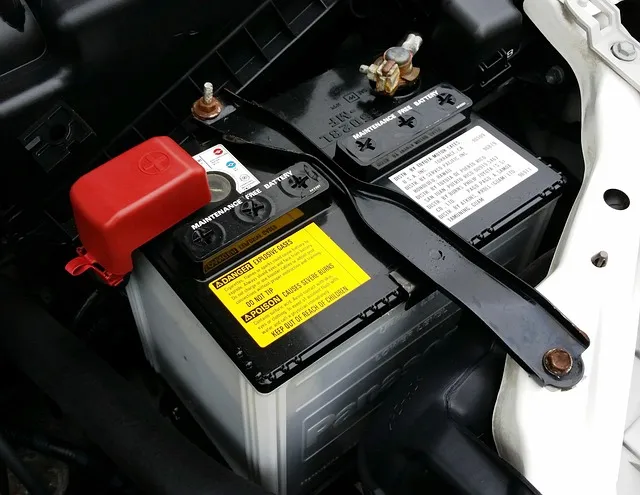 New car battery installed in engine bay