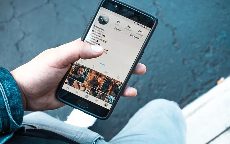 Smartphone connected to car via Bluetooth for hands-free calling and music