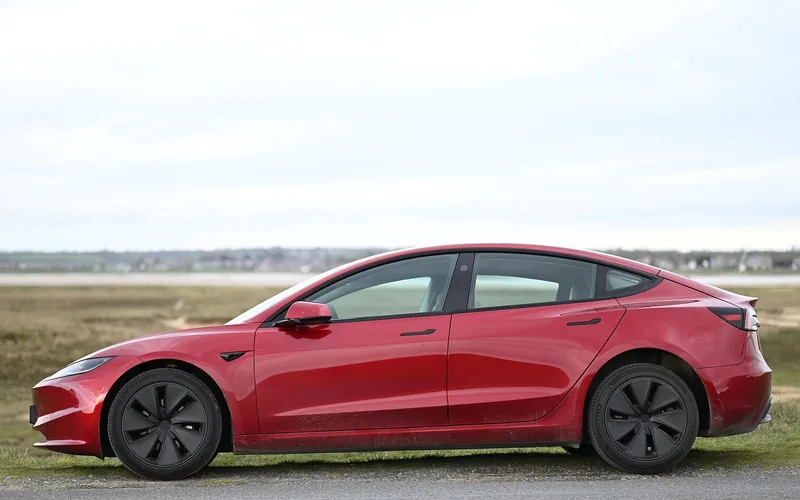 Tesla Model 3 electric car parked — no gas engine or fuel tank