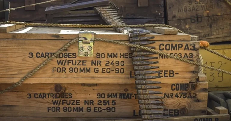Wooden ammunition crate with rounds, illustrating ammo storage