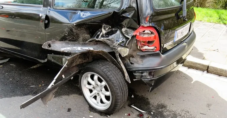 Two damaged cars after a rear-end collision for an insurance claim