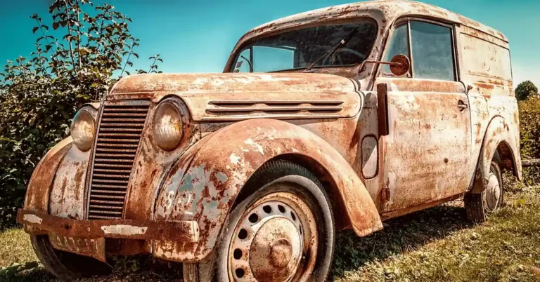 Rusty old car body before a vinyl wrap installation