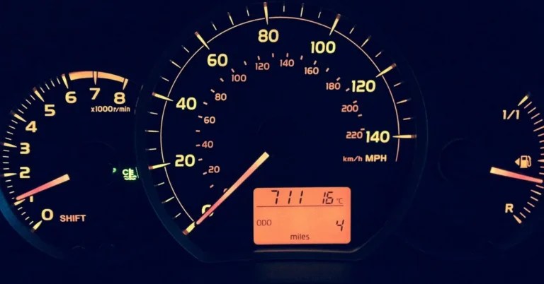 Car odometer showing high mileage