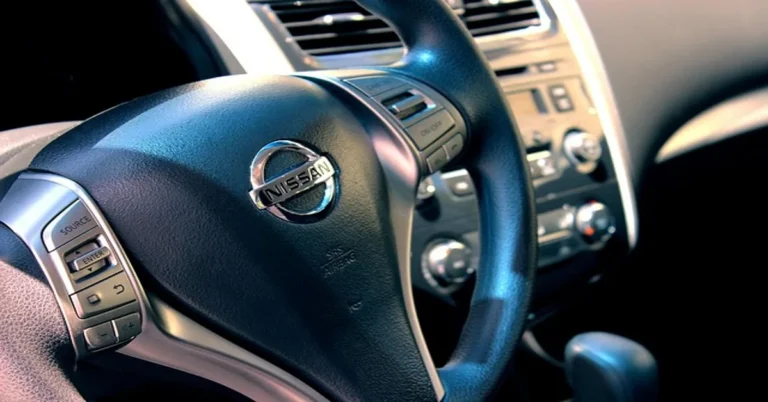 Close-up of a car dashboard and center console showing trim-level details