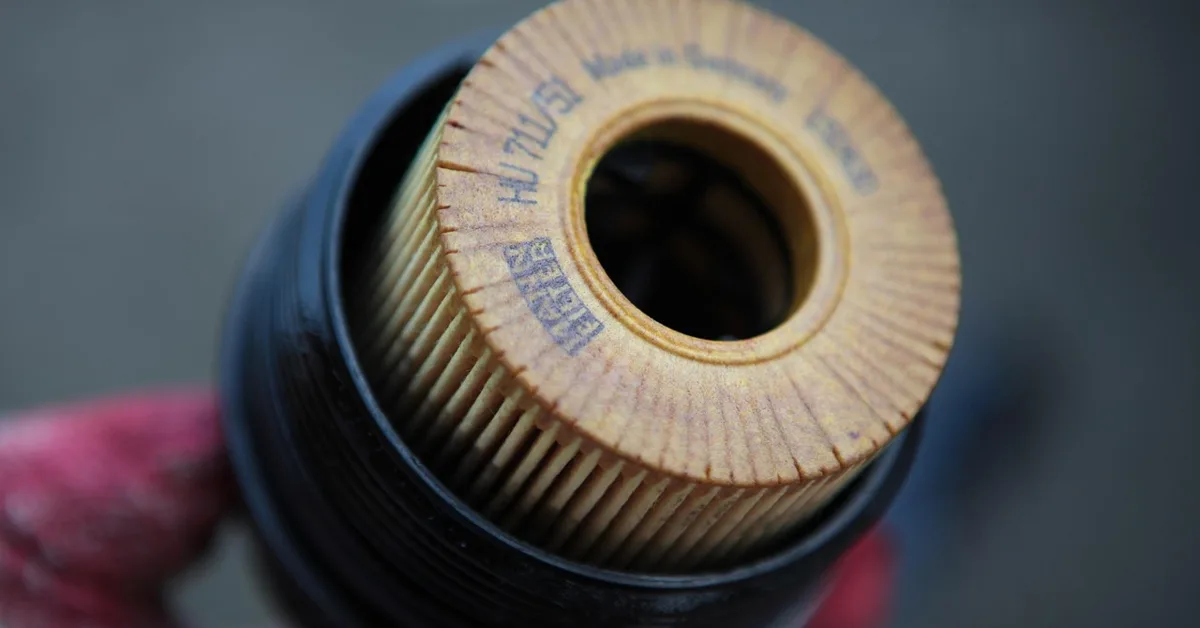 Close-up of an automotive oil filter during maintenance