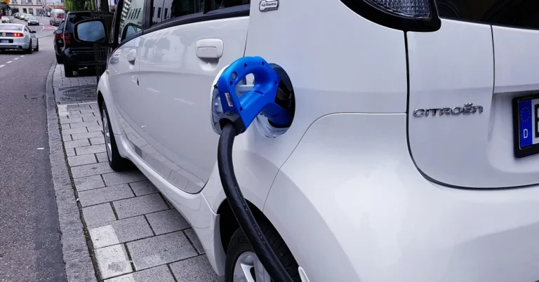 Electric vehicle charging cable plugged in