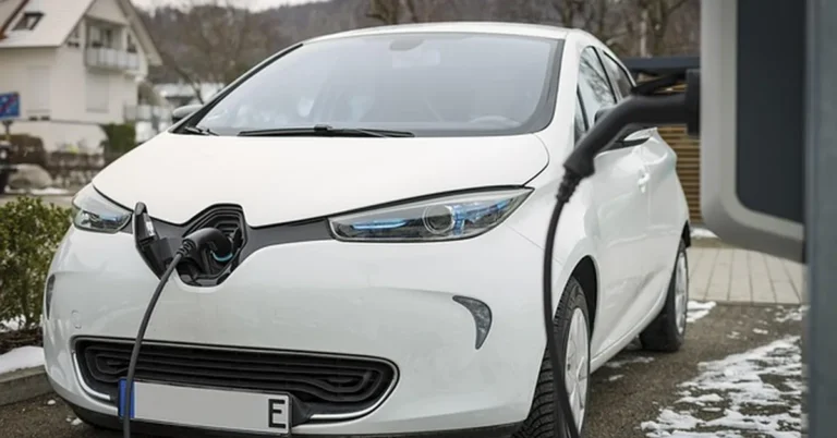 Electric hybrid car charging outdoors