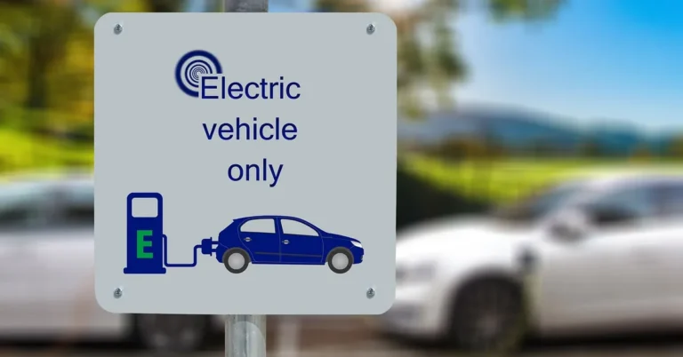 Electric vehicle only parking sign with EV charging icon