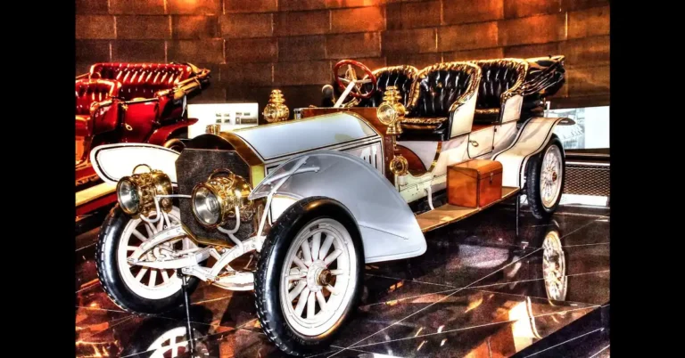 An early 1900s automobile on display in a car history museum