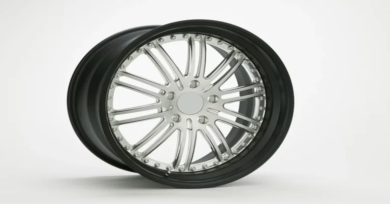 Chrome Ford 6-lug wheel next to a black steel rim, illustrating bolt pattern comparison