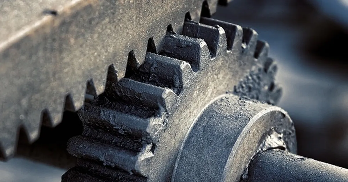 Close-up of interlocking steel gear teeth representing rear differential gear ratios