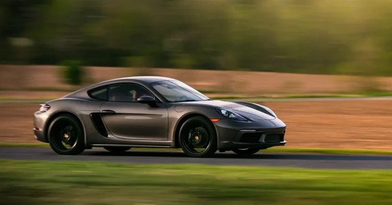 A foreign sports car driving on an open road