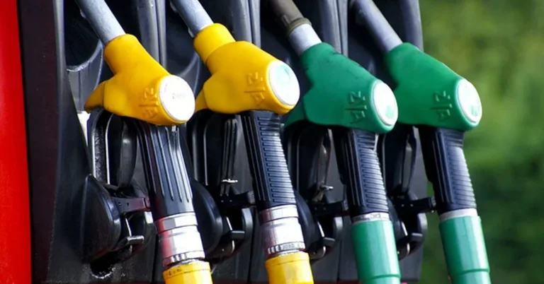 Fuel pump nozzles at a gas station