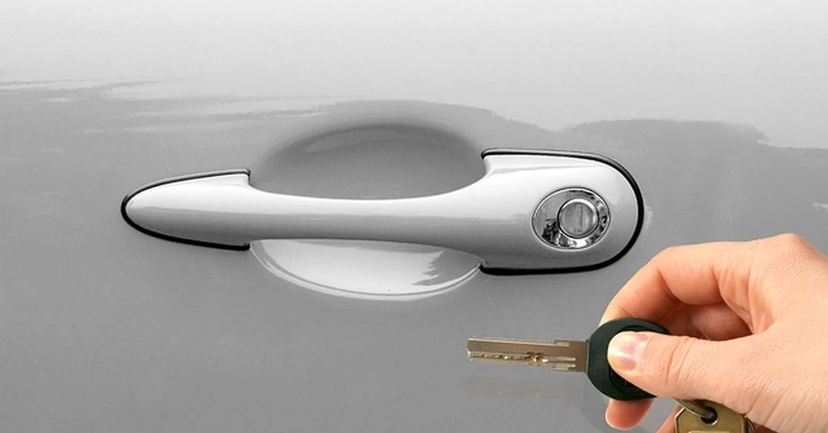 Handing over a car key at the door