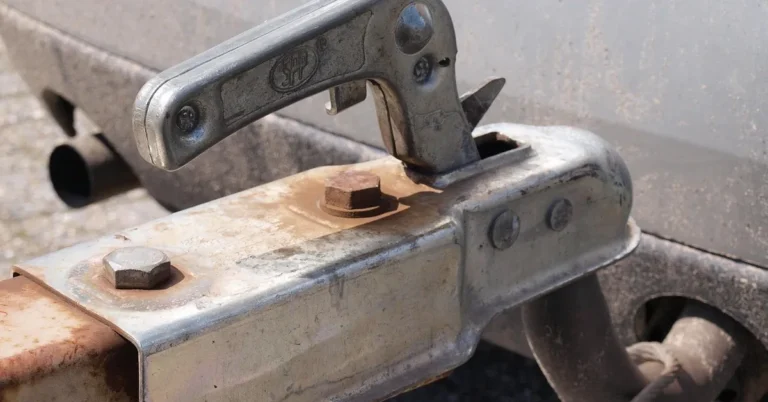 Close-up of a trailer hitch and tow ball mount used for towing comparisons