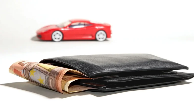 Car keys and cash representing a car finance loan term