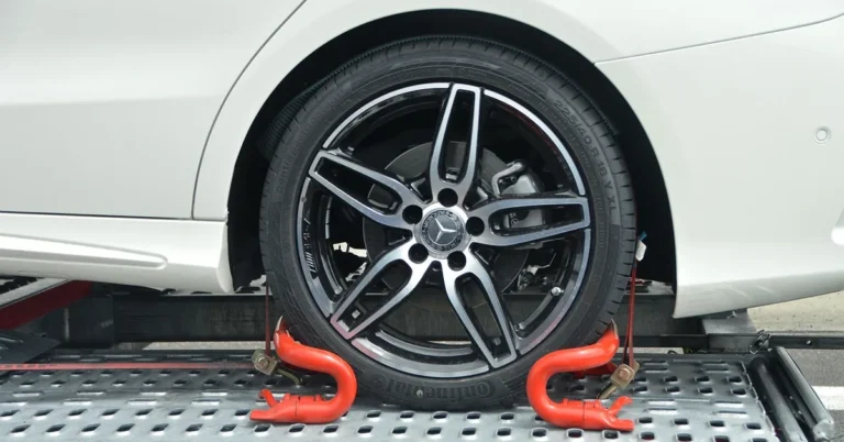 SUV being towed on a trailer or dolly