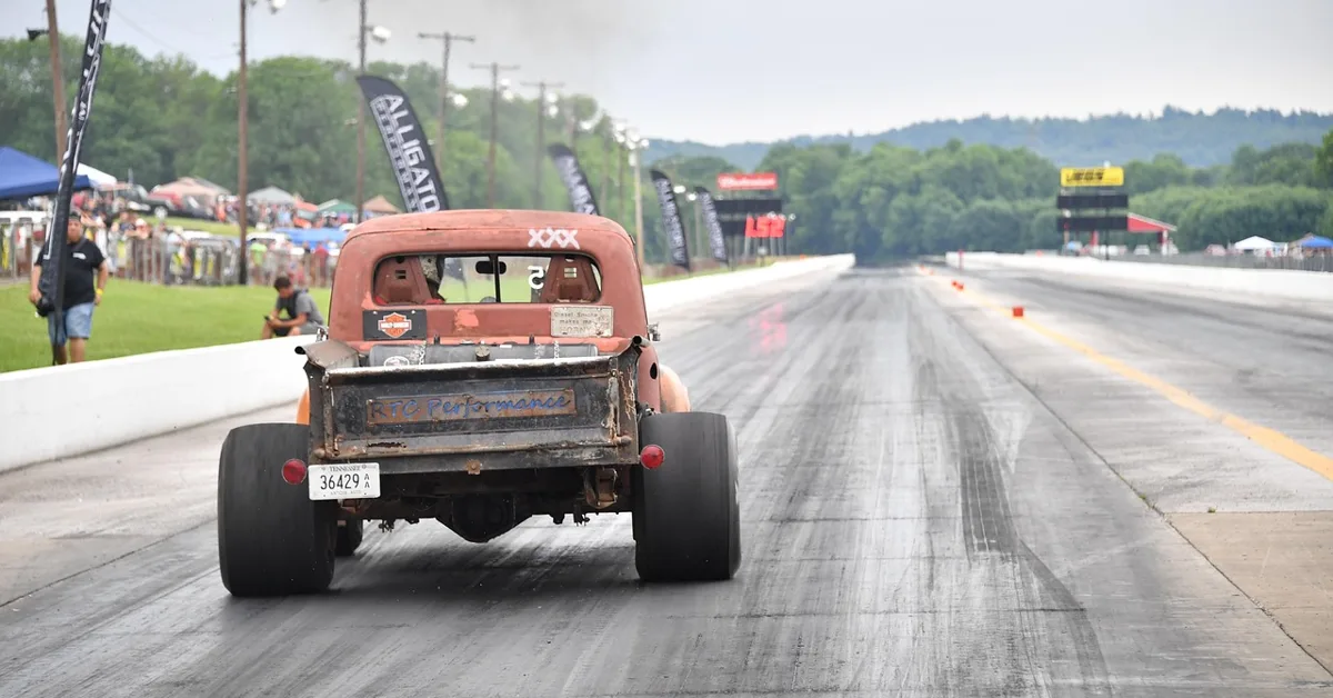 Truck performing a burnout with tire smoke