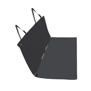 Amazon Basics waterproof black dog car seat cover folded flat showing the bench-style back seat design