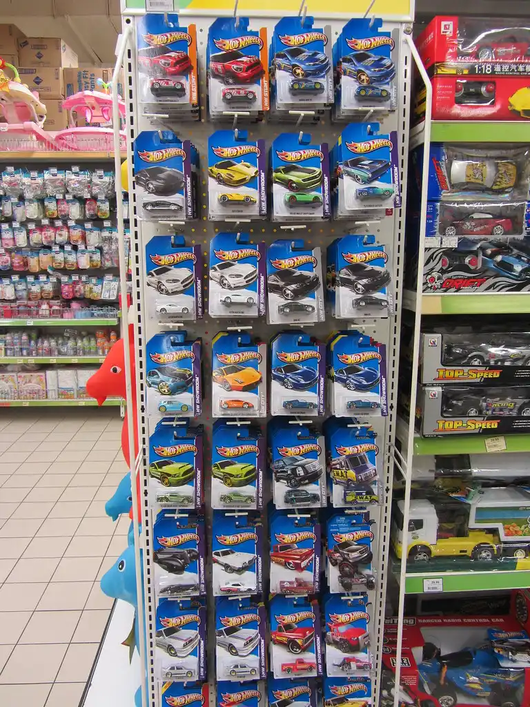 Close-up of Hot Wheels pop culture car packages showing card art and deco details
