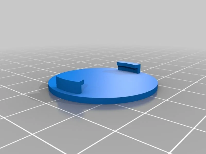 Hands opening a key fob and placing a coin-cell battery beside it