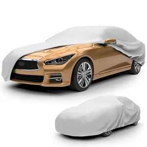 Budge Lite gray breathable car cover fitted over a sedan for indoor dust protection