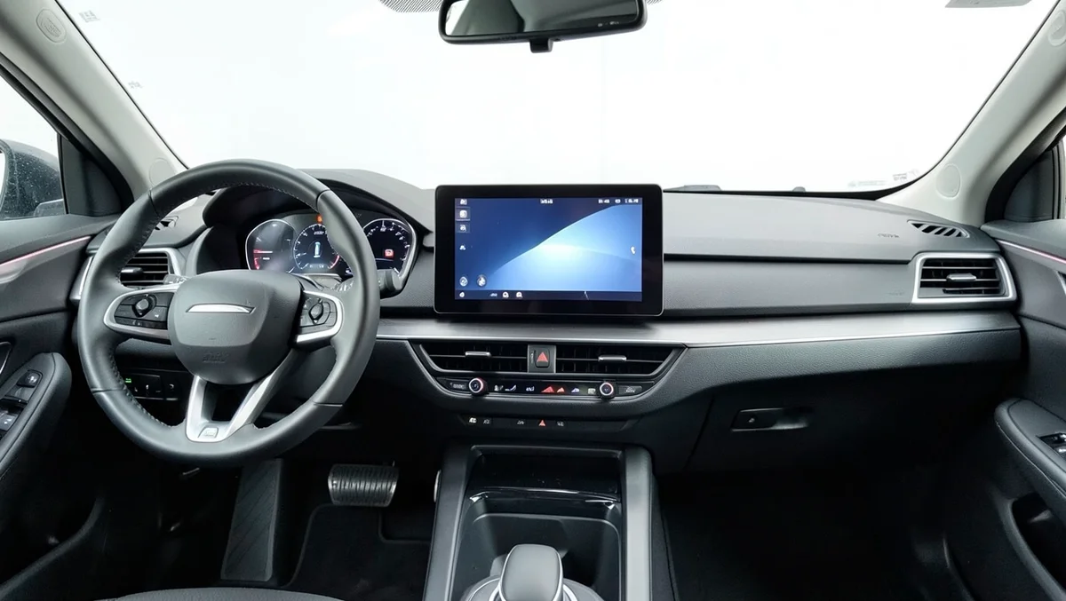 Modern electric vehicle dashboard with a digital infotainment display instead of a traditional radio dial