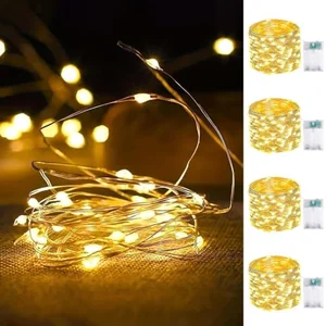 4 pack of battery operated warm white LED fairy string lights with individual battery packs