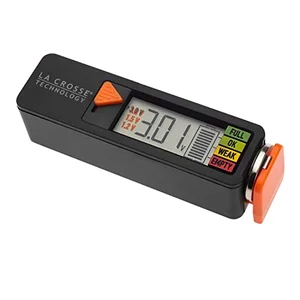 La Crosse digital battery tester showing charge level of a coin cell battery