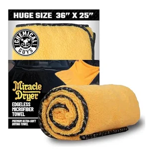 Chemical Guys yellow large microfiber drying towel, 36 by 25 inches, rolled next to its packaging