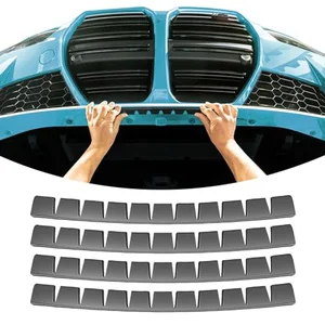 Four-pack polyurethane front bumper guard strips installed along the lower edge of a car bumper