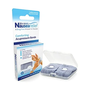 Sea-Band anti-nausea acupressure wristband used to prevent motion sickness while reading in a car