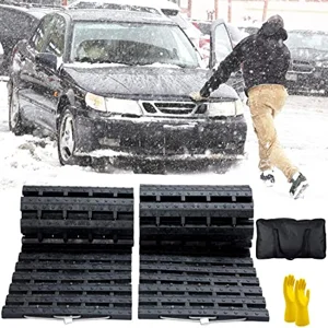 Tire traction recovery mats for freeing a stuck AWD or 4WD vehicle from snow, ice, or mud