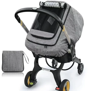 Gray waterproof windproof canopy cover draped over an infant car seat carrier