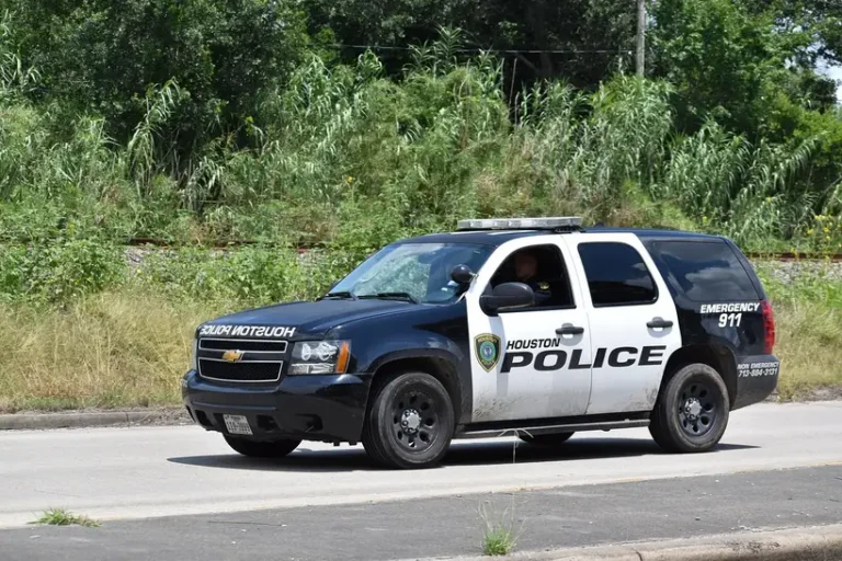 Chevy Tahoe Z71 and RST parked side by side at a scenic overlook