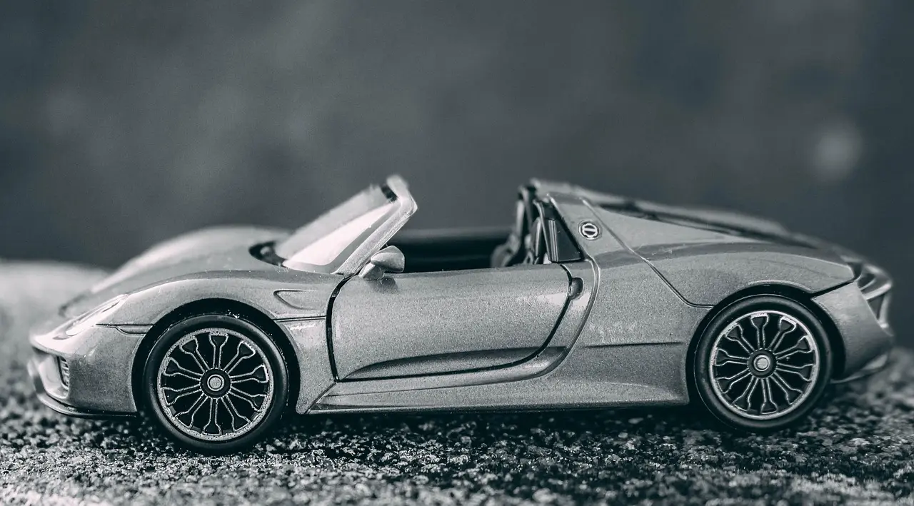 Hot Wheels Car Culture cars beside price tags and a receipt on a collector’s desk