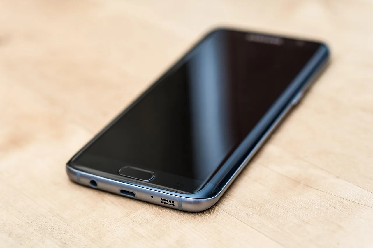 How do you connect your phone and smart devices to the car?
