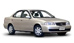 Hand checking a car rental booking on a smartphone next to keys and a folded map